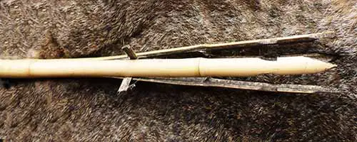 Bamboo fishing spear head with wood separators
