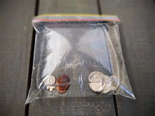 The penny, nickel, dime, and quarter work really well together in a clear plastic bag to keep flies out of your house.